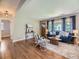 Inviting living room with hardwood floors, comfortable seating, and bright windows at 1350 E Amherst Ave, Englewood, CO 80113
