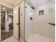 Contemporary shower with glass enclosure, white subway tile, and sleek black fixtures at 1350 E Amherst Ave, Englewood, CO 80113
