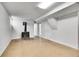 Unfinished basement featuring a retro, charming, vintage stove, and ample space for storage and projects at 7819 Tejon St, Denver, CO 80221