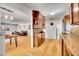 Lovely kitchen with stainless appliances and backsplash that flows into the dining room at 7819 Tejon St, Denver, CO 80221