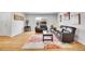 Comfortable living room features stylish seating, bamboo floors, and bright natural light at 7819 Tejon St, Denver, CO 80221