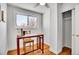 Bright office nook with a large window and functional desk, perfect for a work-from-home setup at 7819 Tejon St, Denver, CO 80221