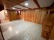 Finished basement with wood paneling and tile flooring at 660 Wolff St, Denver, CO 80204
