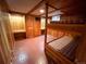 Basement bedroom features a desk, bunk bed and built in shelving at 660 Wolff St, Denver, CO 80204