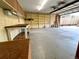 A garage space equipped with storage shelving and ample workspace at 660 Wolff St, Denver, CO 80204