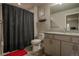 Full bathroom featuring a shower with black curtain, toilet, and vanity with granite countertop at 12254 Hazel Spruce Ct, Parker, CO 80134