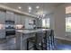 Modern kitchen with stainless steel appliances and quartz countertops, ideal for cooking at 12254 Hazel Spruce Ct, Parker, CO 80134