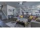 Bright, open living room featuring hardwood floors and modern decor at 12254 Hazel Spruce Ct, Parker, CO 80134