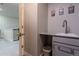 A convenient sink area on the upper level with granite counters and updated faucet at 12254 Hazel Spruce Ct, Parker, CO 80134