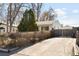 Spacious driveway providing ample parking and easy access to the home's rear entrance at 3740 W Exposition Ave, Denver, CO 80219