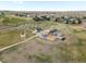 Neighborhood aerial featuring park with picnic area, playground, and walking paths at 1344 S Coolidge Cir, Aurora, CO 80018