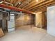 Unfinished basement, exposed ceiling, ready to customize at 1344 S Coolidge Cir, Aurora, CO 80018