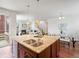 Spacious island kitchen flows to dining and living areas, great for entertaining at 1344 S Coolidge Cir, Aurora, CO 80018