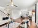 Spacious living room with an open floor plan connecting the kitchen and dining areas at 1344 S Coolidge Cir, Aurora, CO 80018
