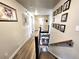 Upstairs hallway with modern decor and easy access to the second floor at 11285 Kenton St, Commerce City, CO 80640