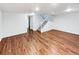 Spacious finished basement with hardwood floors, a staircase, and recessed lighting at 3061 W 92Nd Ave # 11B, Westminster, CO 80031