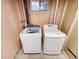 Basement laundry room with a modern washer and dryer set at 3061 W 92Nd Ave # 11B, Westminster, CO 80031