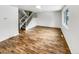 Bright living room with wood flooring and white walls, showcasing a modern, minimalist design at 3061 W 92Nd Ave # 11B, Westminster, CO 80031