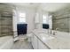 Updated bathroom with modern fixtures, tiled shower, and ample counter space at 15389 E 99Th Way, Commerce City, CO 80022