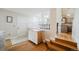 Foyer with stairs leading to the upper level and featuring hardwood floors at 15389 E 99Th Way, Commerce City, CO 80022