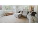 Inviting living area with natural light and a plush sectional sofa at 15389 E 99Th Way, Commerce City, CO 80022