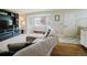 Cozy living room with a fireplace and comfortable seating arrangement at 15389 E 99Th Way, Commerce City, CO 80022
