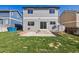 Spacious backyard featuring a well-maintained lawn and patio at 16006 E 97Th Pl, Commerce City, CO 80022