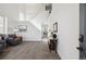 Living room with vaulted ceilings, carpeted floors and neutral paint at 16006 E 97Th Pl, Commerce City, CO 80022