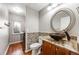 Stylish bathroom with a vessel sink, decorative tile, and laundry area nearby at 11053 Meadowvale Cir, Highlands Ranch, CO 80130