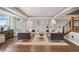 Open-concept living room featuring contemporary decor, hardwood floors, and modern lighting at 1891 Curtis St # 1812, Denver, CO 80202