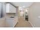 Basement wet bar with cabinets and countertop at 89 Dawn Heath Cir, Littleton, CO 80127