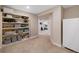 Finished basement with storage shelving and home gym at 89 Dawn Heath Cir, Littleton, CO 80127