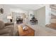 Formal dining area with hardwood floors, a chandelier, and built-in cabinetry at 89 Dawn Heath Cir, Littleton, CO 80127