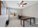 Spacious home office with L-shaped desk and window at 89 Dawn Heath Cir, Littleton, CO 80127