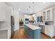 Modern kitchen featuring an island and stainless steel appliances at 89 Dawn Heath Cir, Littleton, CO 80127