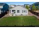 Well-maintained backyard with lush green lawn and patio, perfect for outdoor activities and entertaining at 14431 Forest St, Thornton, CO 80602