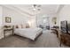 This main bedroom features a seating area and a tv at 14431 Forest St, Thornton, CO 80602
