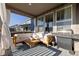 Cozy outdoor patio complete with comfortable seating and a grill, perfect for entertaining or relaxing at 14431 Forest St, Thornton, CO 80602