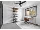 Bedroom with natural light, desk, and decorative shelving at 3000 N Fillmore St, Denver, CO 80205