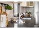 This kitchen features a stainless steel sink, a modern faucet, and black countertops at 3000 N Fillmore St, Denver, CO 80205