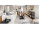 Bright, open-concept living room featuring wood floors and stylish furniture at 3000 N Fillmore St, Denver, CO 80205