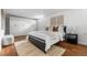 Spacious bedroom with built-in closets, stylish decor, and cozy rug, creating a relaxing retreat at 3000 N Fillmore St, Denver, CO 80205