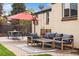 Inviting backyard patio with lounge seating and dining area, perfect for outdoor gatherings at 3000 N Fillmore St, Denver, CO 80205