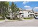 Townhouse exterior with a sidewalk and front yards at 18038 Becket Dr, Parker, CO 80134