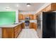 Well-equipped kitchen with stainless steel appliances and ample cabinet space at 18038 Becket Dr, Parker, CO 80134