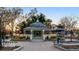 Gazebo in a park with benches and a table and an umbrella at 18038 Becket Dr, Parker, CO 80134