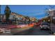 Street view of Parker with storefronts at dusk at 18038 Becket Dr, Parker, CO 80134