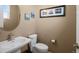 Elegant half bathroom with modern fixtures and stylish decor at 11177 E 162Nd Pl, Brighton, CO 80602