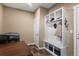 Functional mudroom with built-in storage and bench at 11177 E 162Nd Pl, Brighton, CO 80602