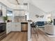 Well-lit kitchen showcasing stainless steel appliances and white cabinets at 11195 Alcott St # D, Westminster, CO 80234